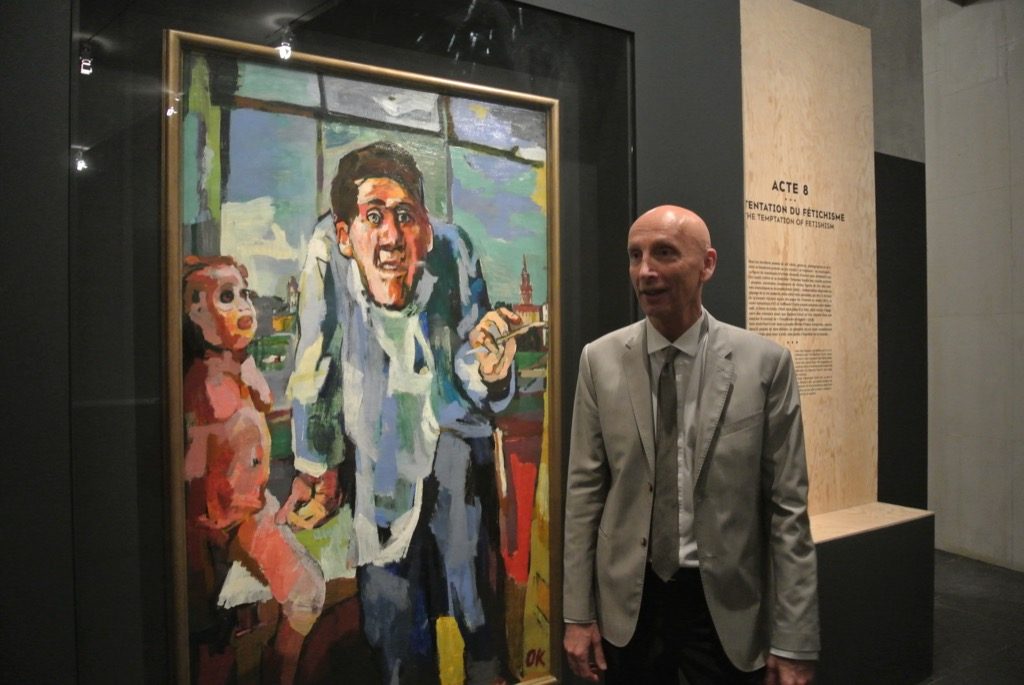 THe curator François Boudeau with Kokoschka's mad "self-portrait with chevalet", 1922