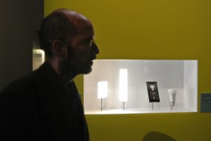 Designer Antoine Fenoglio had the idea for this exhibition. Behind him flat LED lights 
