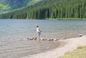 Miranda Hickox, inspired by the lake, practices yoga