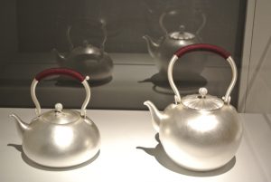 Silver tea pots with string handle