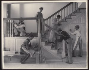 Johnston, Frances Benjamin (1864-1952): Stairway of the Treasurer's Residence: Students at Work, plate from an album of Hampton Institute. Hampton, Virginia, 1899-1900.. New York, Museum of Modern Art (MoMA) Platinum print, 7 1/2 x 9 1/2 (19 x 24.1 cm). Gift of Lincoln Kirstein. Acc. n.: 859.1965.136.*** Permission for usage must be provided in writing from Scala. May have restrictions - please contact Scala for details. ***