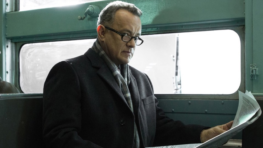 Tom Hanks becomes a national heroe and the future adviser to Kennedy for the Cuban release of the Bay of Pigs prisoners