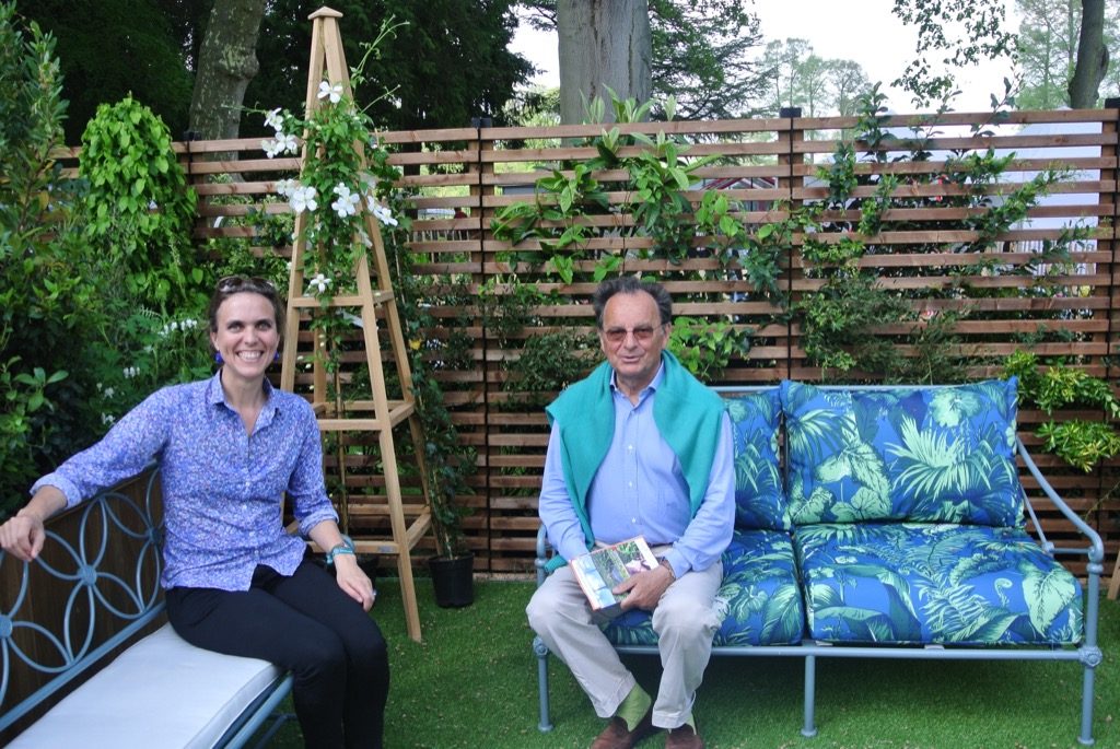 Blanche Aloisi de Crépy and Arnaud Brunel sitting on the new Madeleine Castaing benches by Tectona