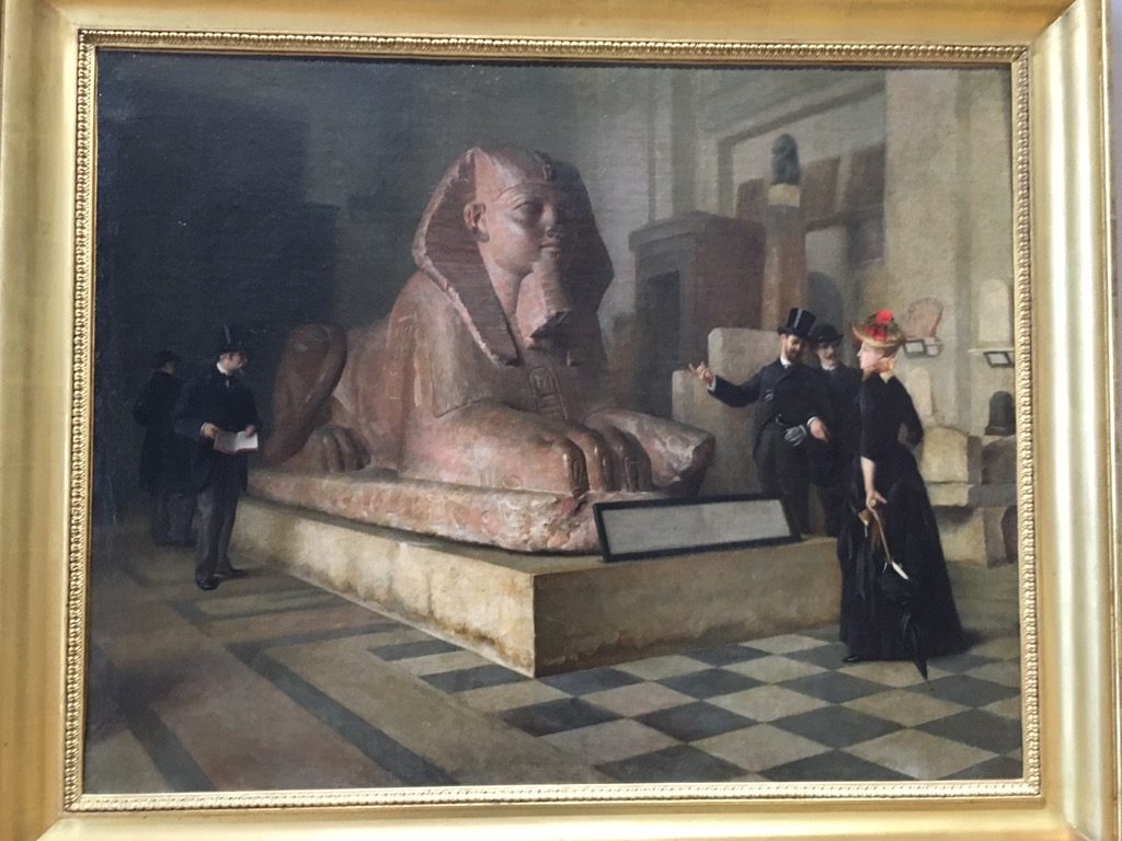 Guillaume Larrue, Egyptian room of he louvre, in front of the great Sphynx, 1875-1900