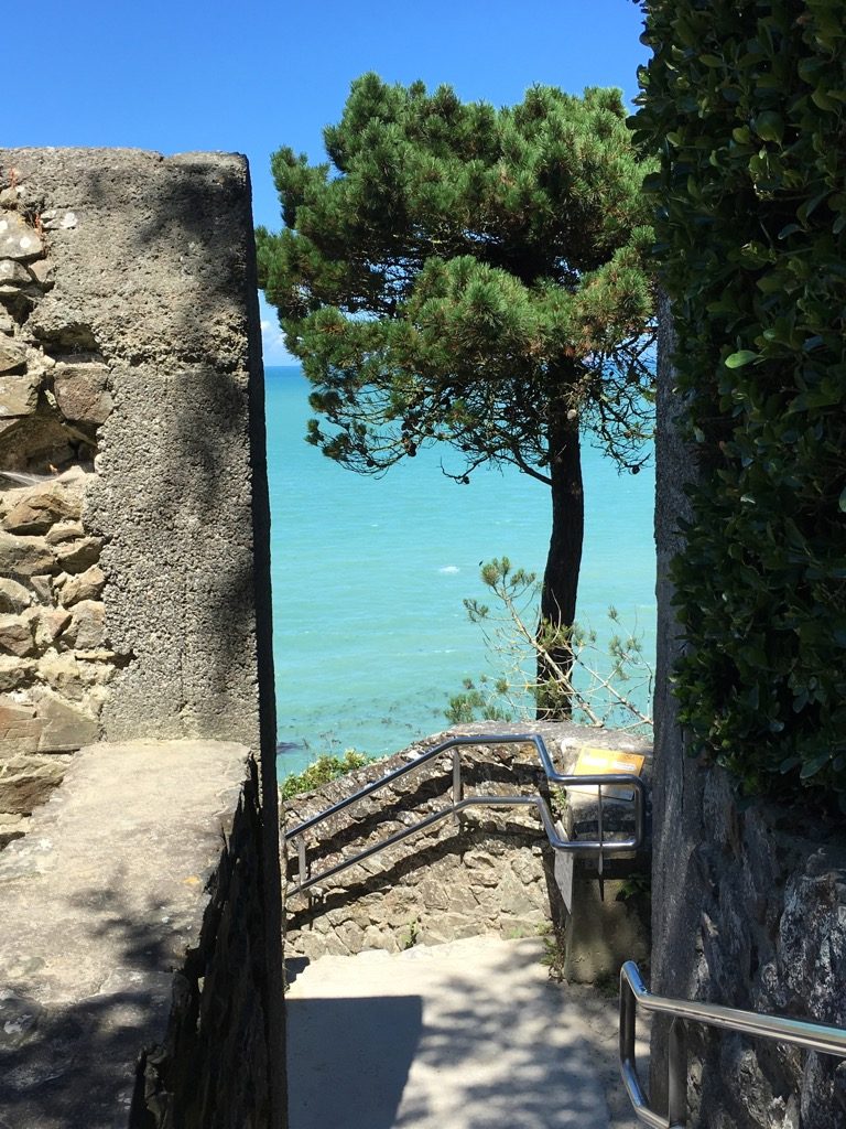 Private stone stairs lead directly to the beach