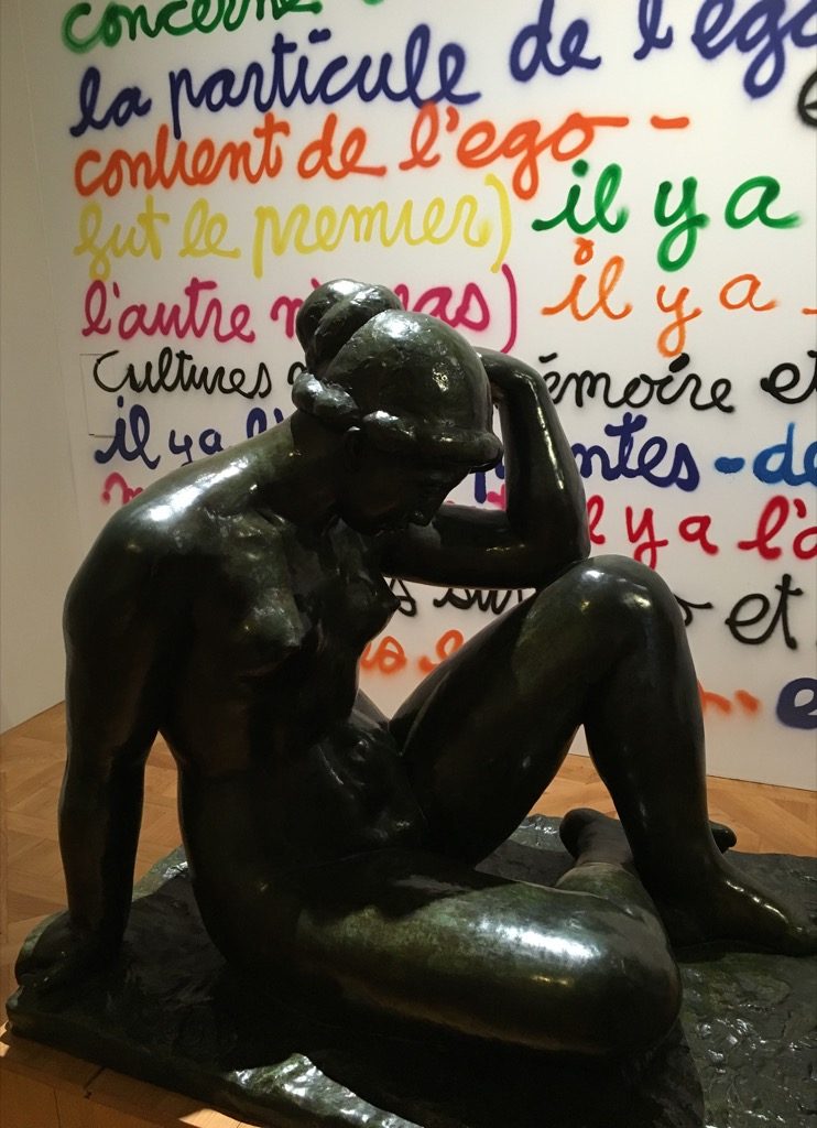 A bronze by Maillol sits in front of Ben's latest painted wall