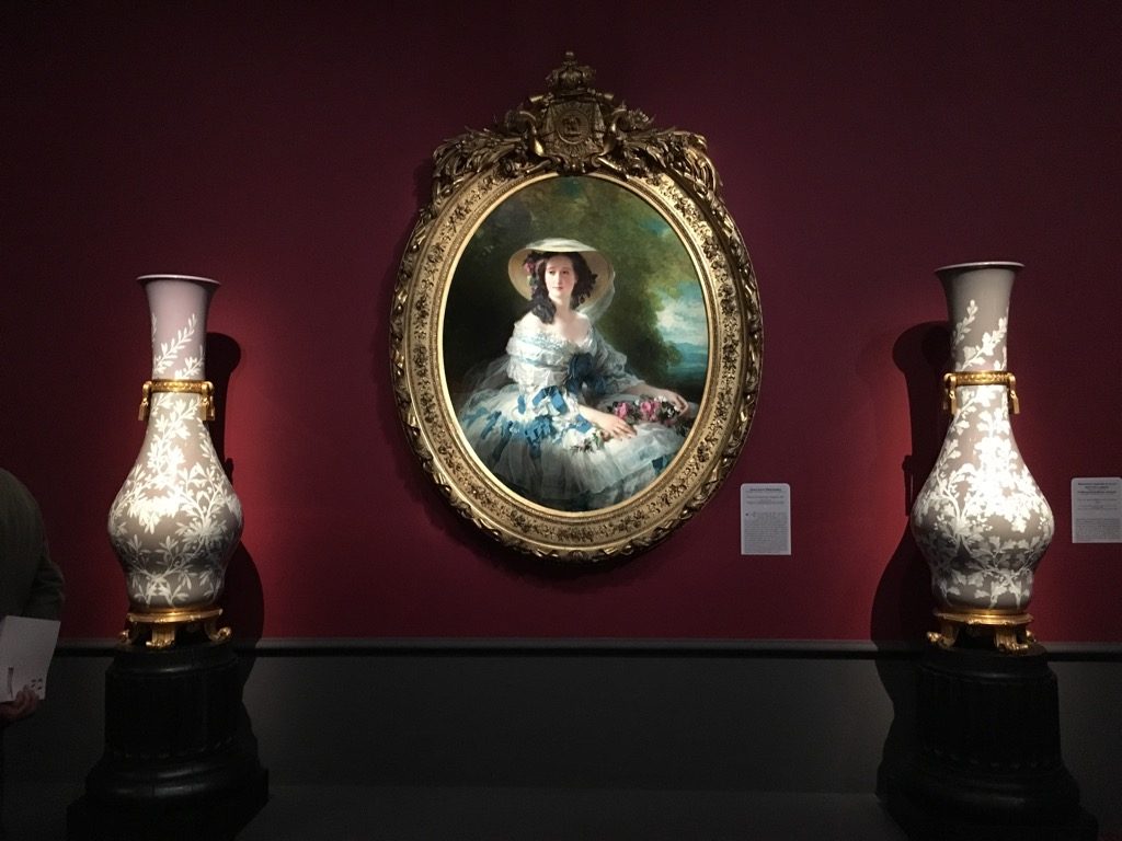 Sévres, pair of porcelain vases, 1862 frame a portrait of Empress Eugénie by Winterhalter, 1857 