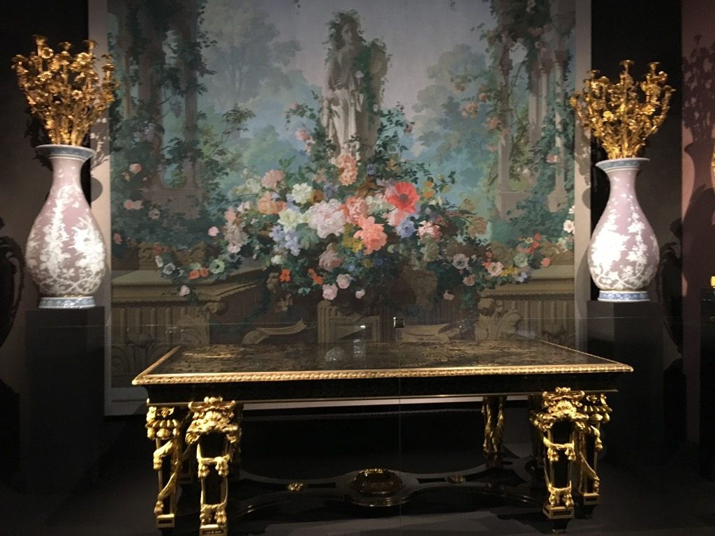 Table in the Louis XIV style, 1867, in front of wallpaper "Le Jardin d'Armide" by Edouard Muller, 1854