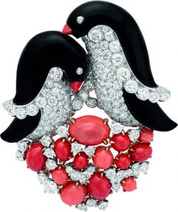 Penguins with a coat of onyx, corals and diamonds