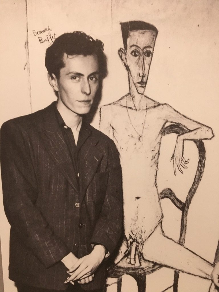 Bernard Buffet at 20 when he wins the Prix de la Critique for this painting "Two men in a room"